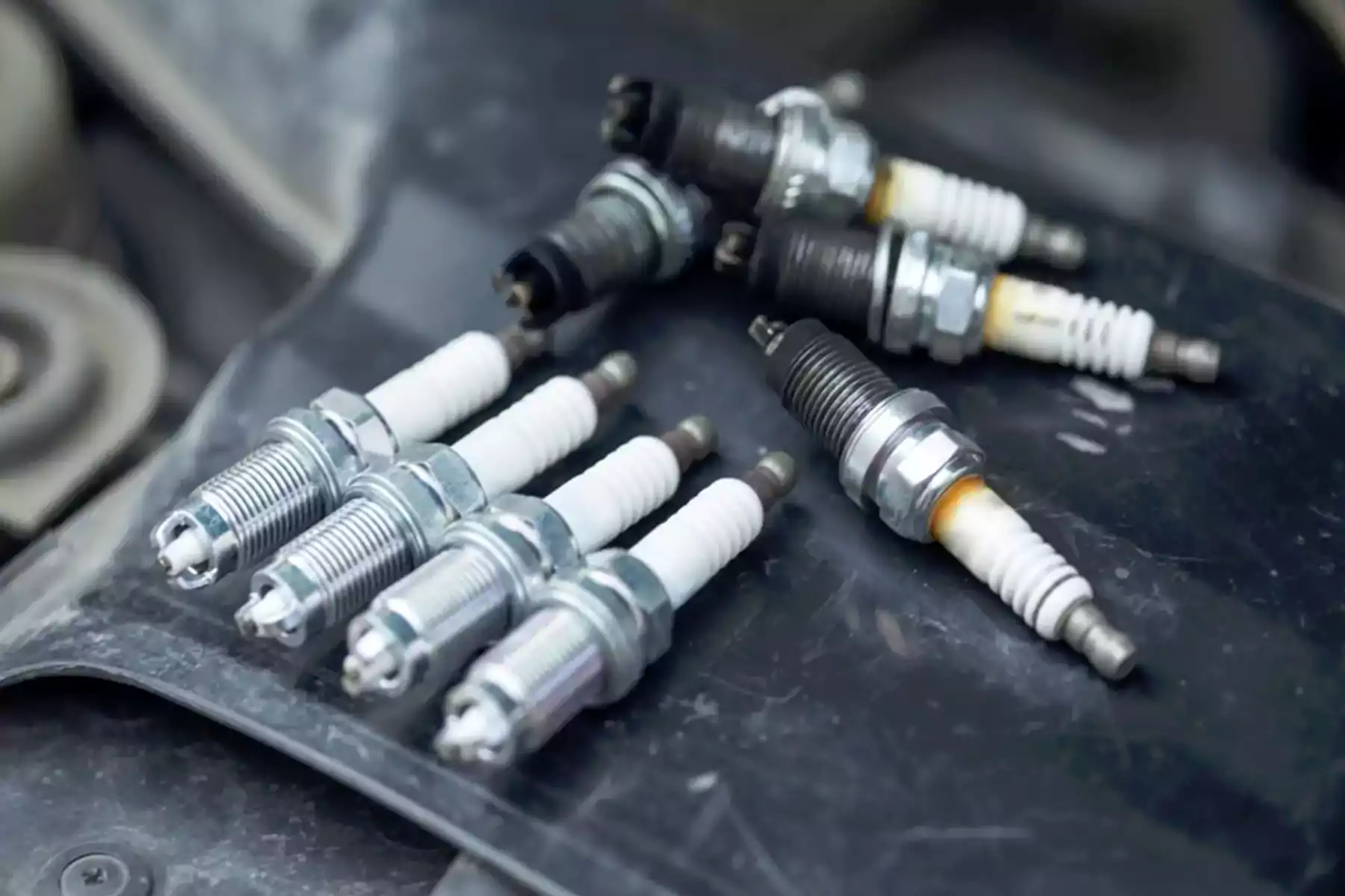 أضرار عدم تغيير البوجيهات: كيف يؤثر على سيارتك وأداء المحرك